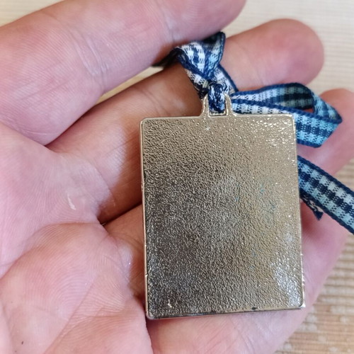 Silver-plated cradle icon
