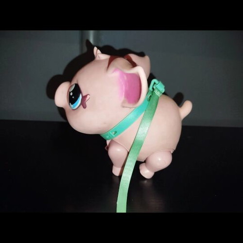 Electronic robotic pig used with sound and movement