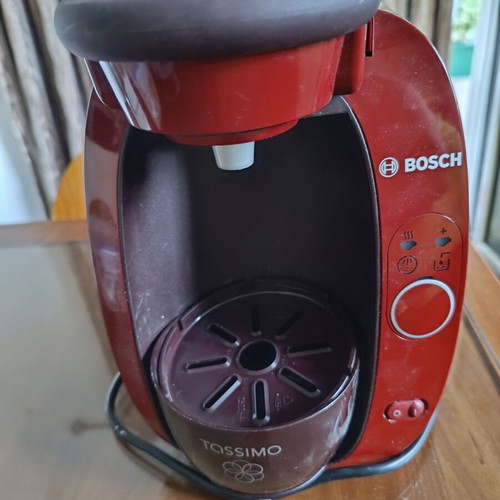 Tassimo coffee machine like new with capsules