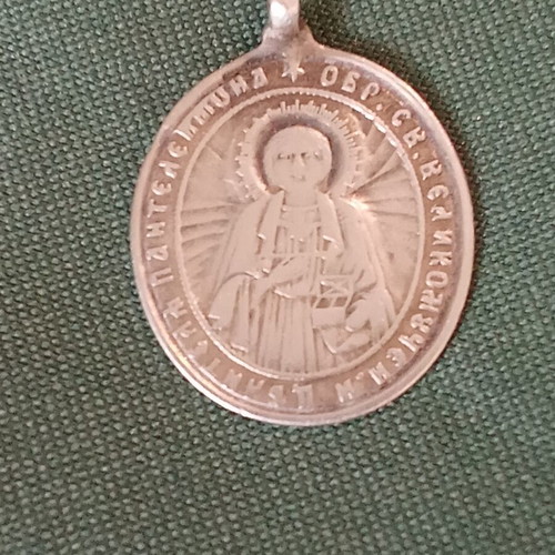 Silver medallion like new, antique with Saint Panteleimon and Virgin Mary