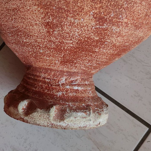 Clay flowerpot used with crack at base