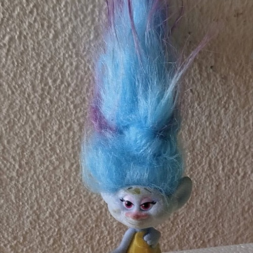 Chenille figure used with long hair and yellow dress