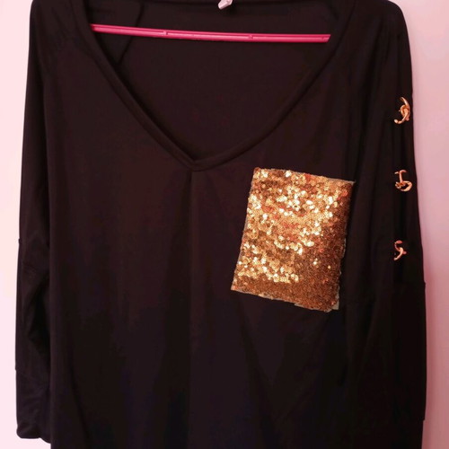 Black elastic blouse with sequin pocket and cutout, like new