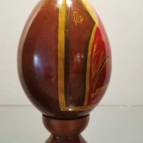 Russian egg used with hand-painted decoration and wooden base