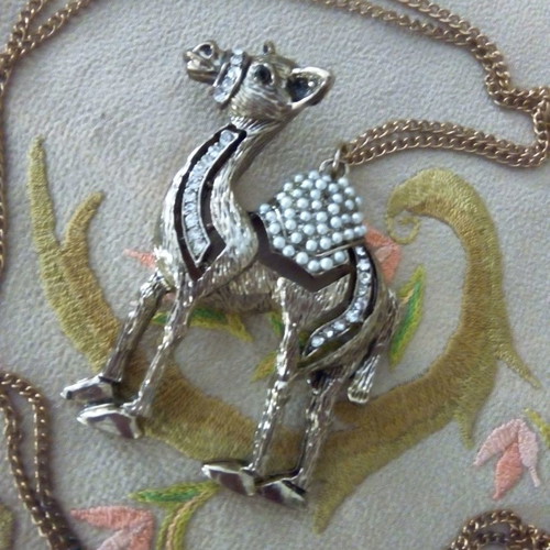 Camel vintage pendant like new with pearls and rhinestones