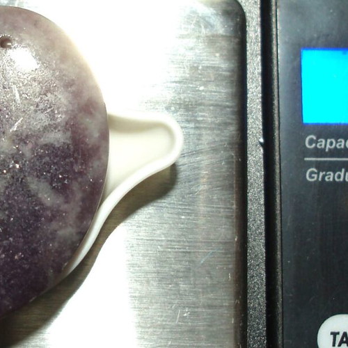 Tanzanite mineral 92.30 ct like new with hole for pendant