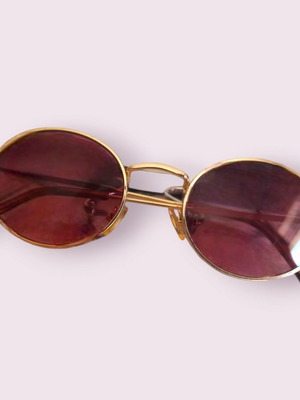 Oval women's sunglasses like new, gold metal frame with tortoiseshell tips