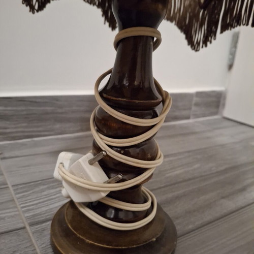 Vintage table lamp with wooden base and embossed fringed shade