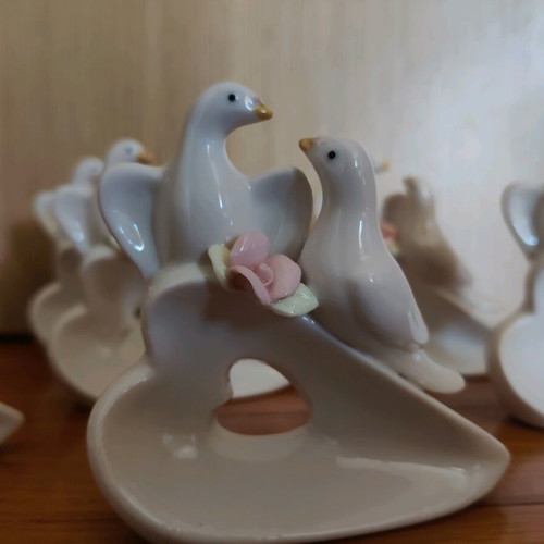 Porcelain decorative doves new, set of 7 pieces