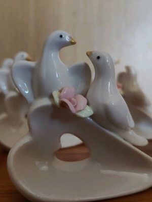 Porcelain decorative doves new, set of 7 pieces