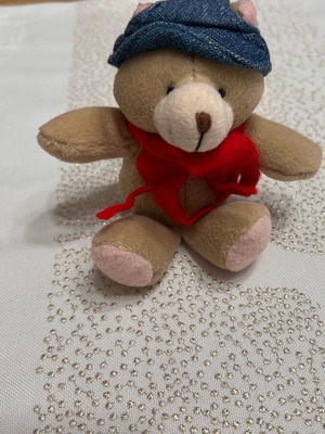 Stuffed bear with hat and scarf like new, small size