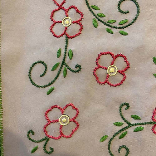 Handmade table linen with embroidery and lace used