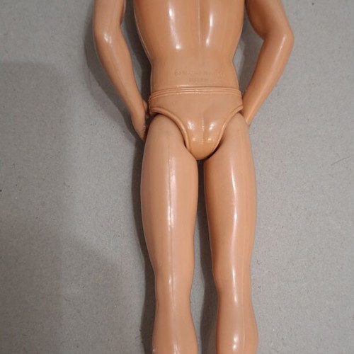 Ken doll used