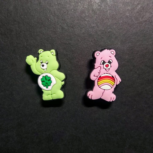 Care Bears Crocs Charms set like new, pink and green