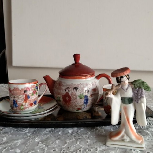 Decorative miniature tea set like new, fine porcelain