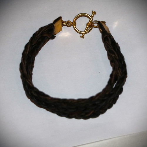 Jewelry bracelet made of genuine leather with 22K gold-plated clasp