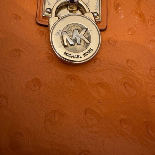 Michael Kors mini leather wallet used orange