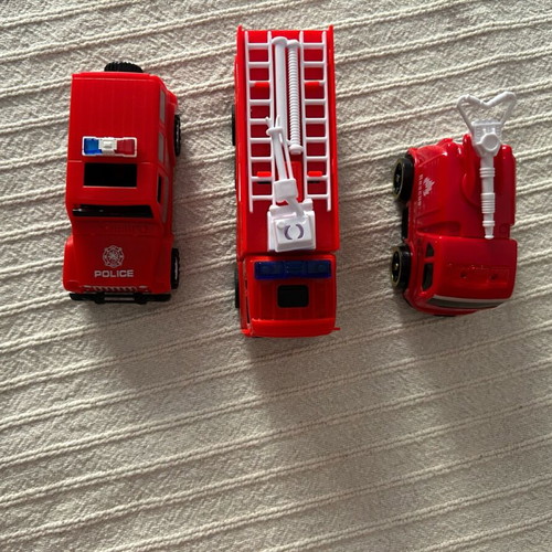 Various vehicles like new, 2 fire trucks and 1 police car
