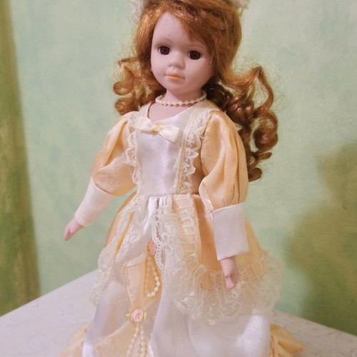 Vintage porcelain doll used