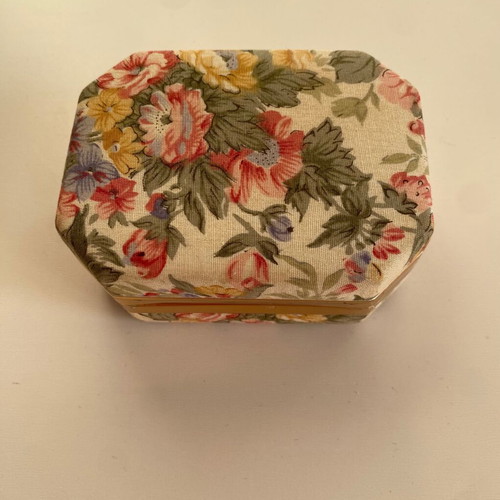 Vintage jewelry box used with mirror and floral fabric design