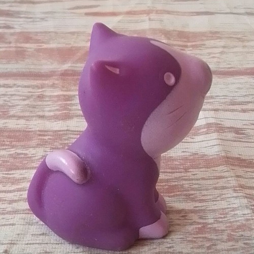 Purple dog squeeze figure like new