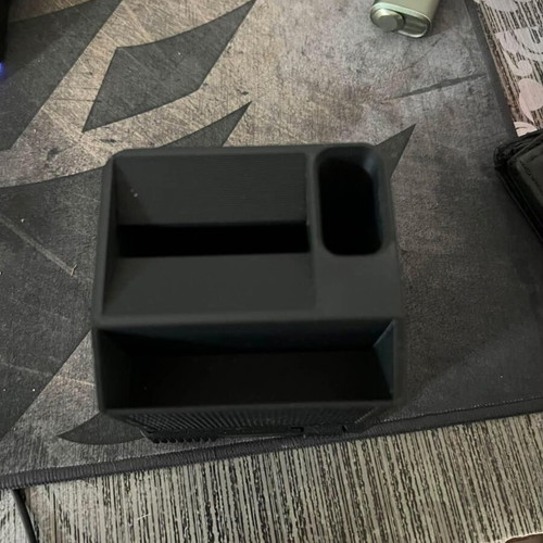 Icos holder with built-in ashtray