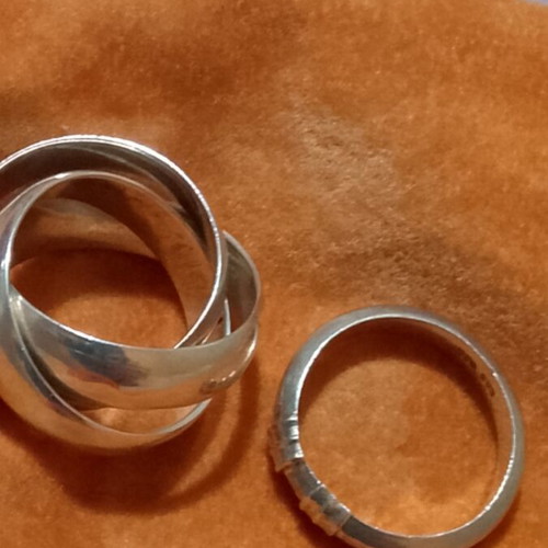 Silver 925 rings, one triple band and one with 585 gold tones