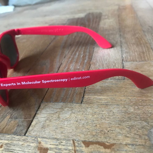 Sunglasses like new with red plastic frame