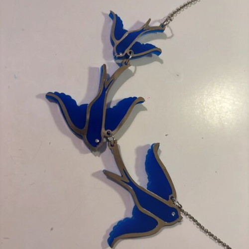 Gold necklace with blue birds used from accessorize