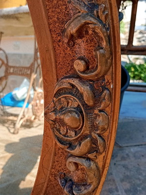 Old carved oval mirror used