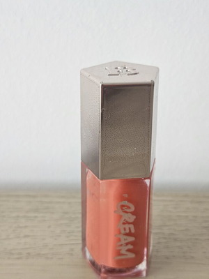 Fenty Beauty Mini Lip Gloss coral shade, almost full