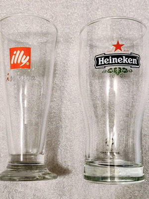 Set of 2 collectible glasses Heineken UEFA Champions League and Illy Issimo like new