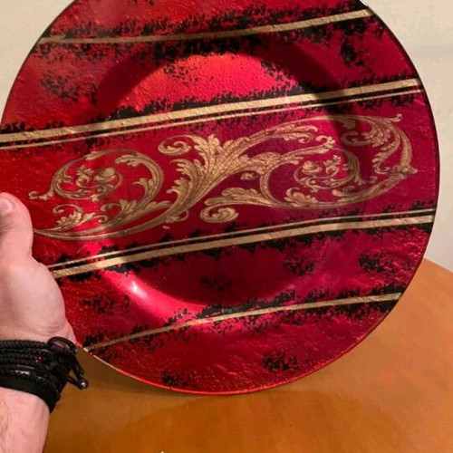 Decorative charger plate like new with embossed gold baroque designs