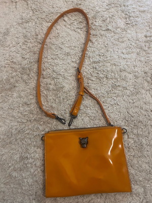 Rocco Barocco crossbody clutch like new, orange