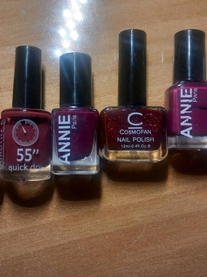 Mano nail polish used in red, purple and gray shades