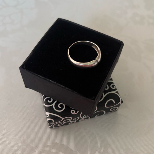 Silver ring with small stones used