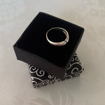 Silver ring with small stones used