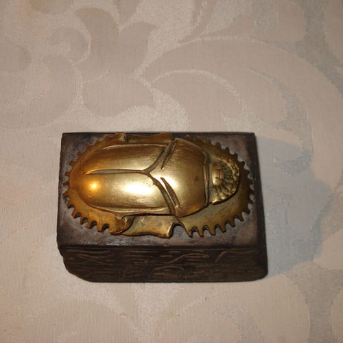 Egyptian bronze decorative scarab used with black hieroglyph base