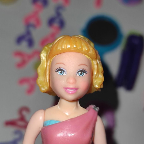 Polly Pocket bag with 9 dolls and accessories used
