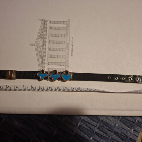Black bracelet with blue decorations like new