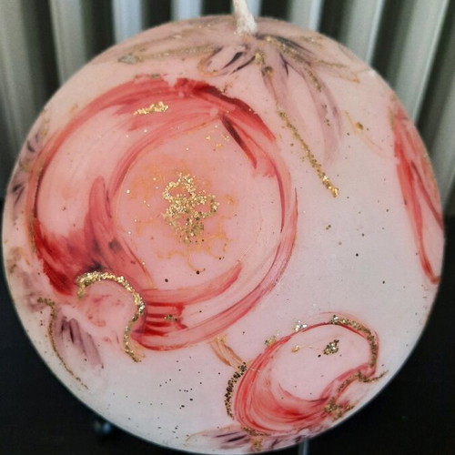 Candle like new with floral design