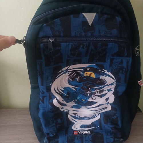 School bag used with visible defects