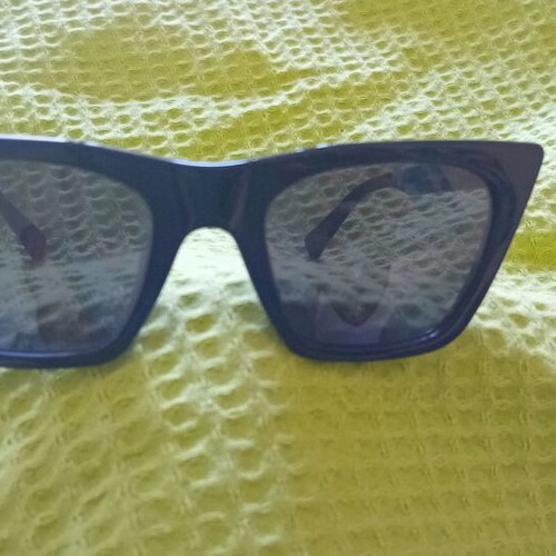 Hawkers women's sunglasses used, black with lens wear