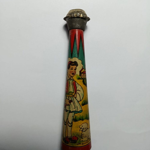 Tin whistle with lithograph used