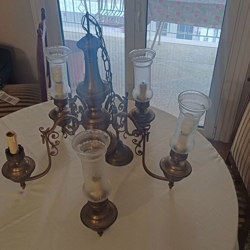 Antique chandeliers used, two pieces with missing crystal covers