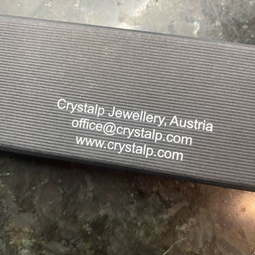 Crystalp steel cross gold color new with missing stone