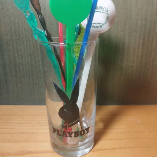 Playboy glass used with disco 80s stirrers