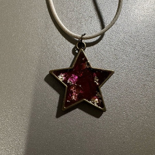 Handmade necklace with white cord and purple star like new