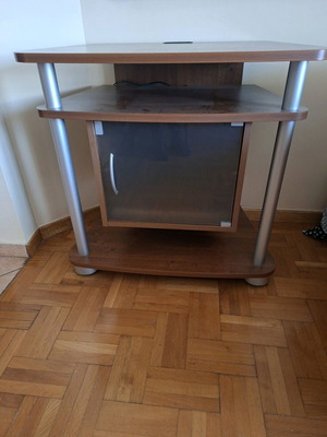 Modern TV stand like new with cabinet and hidden wheels