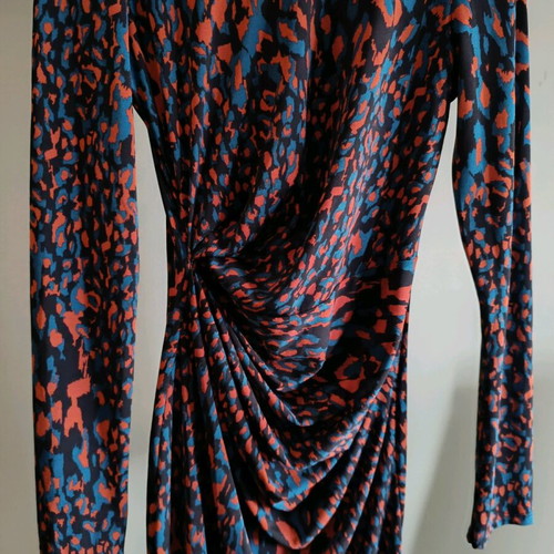 Midi dress like new with draped detail and animal print
